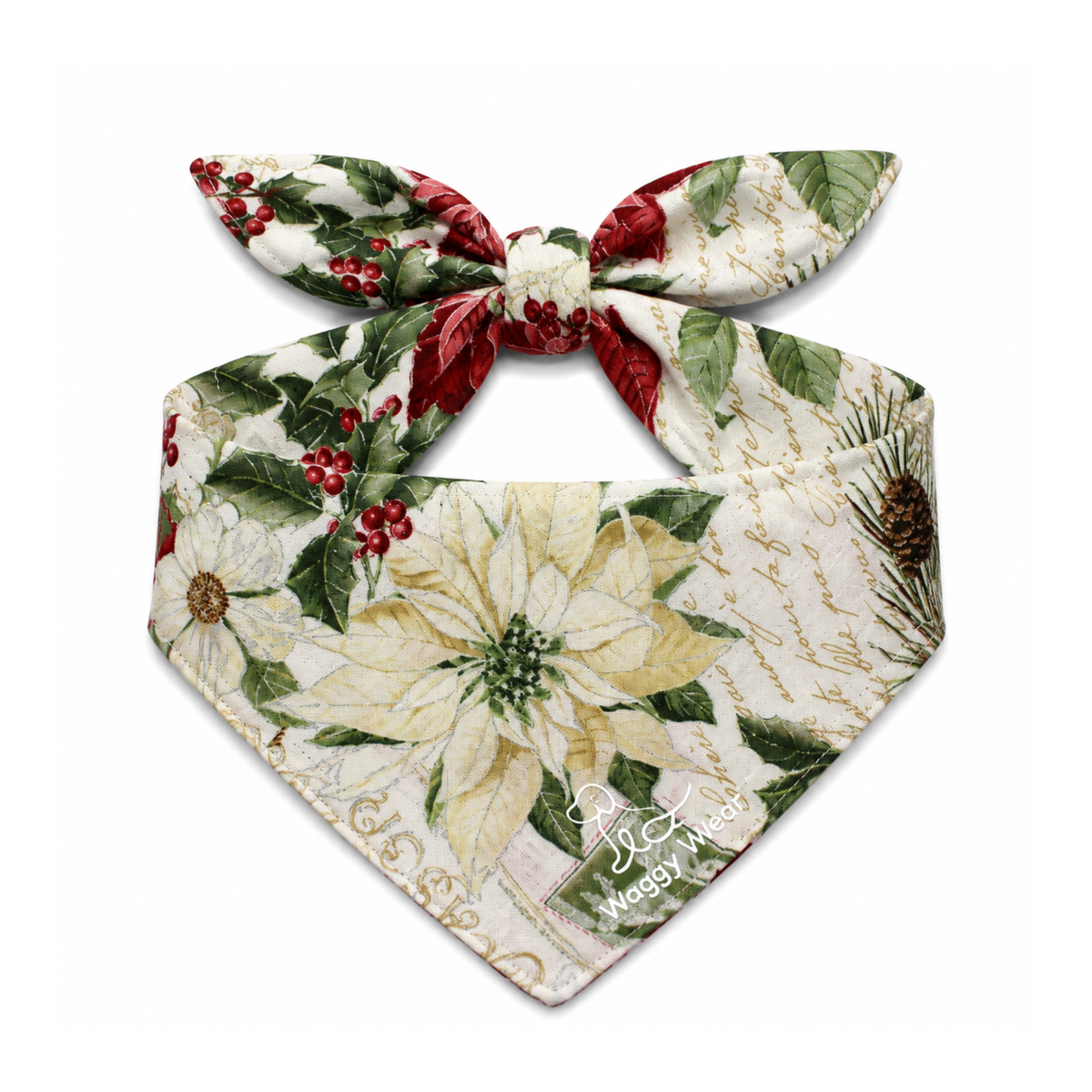 Tie-on dog bandana with white poinsettia, holly berries, and red ribbon bow on a cream background.