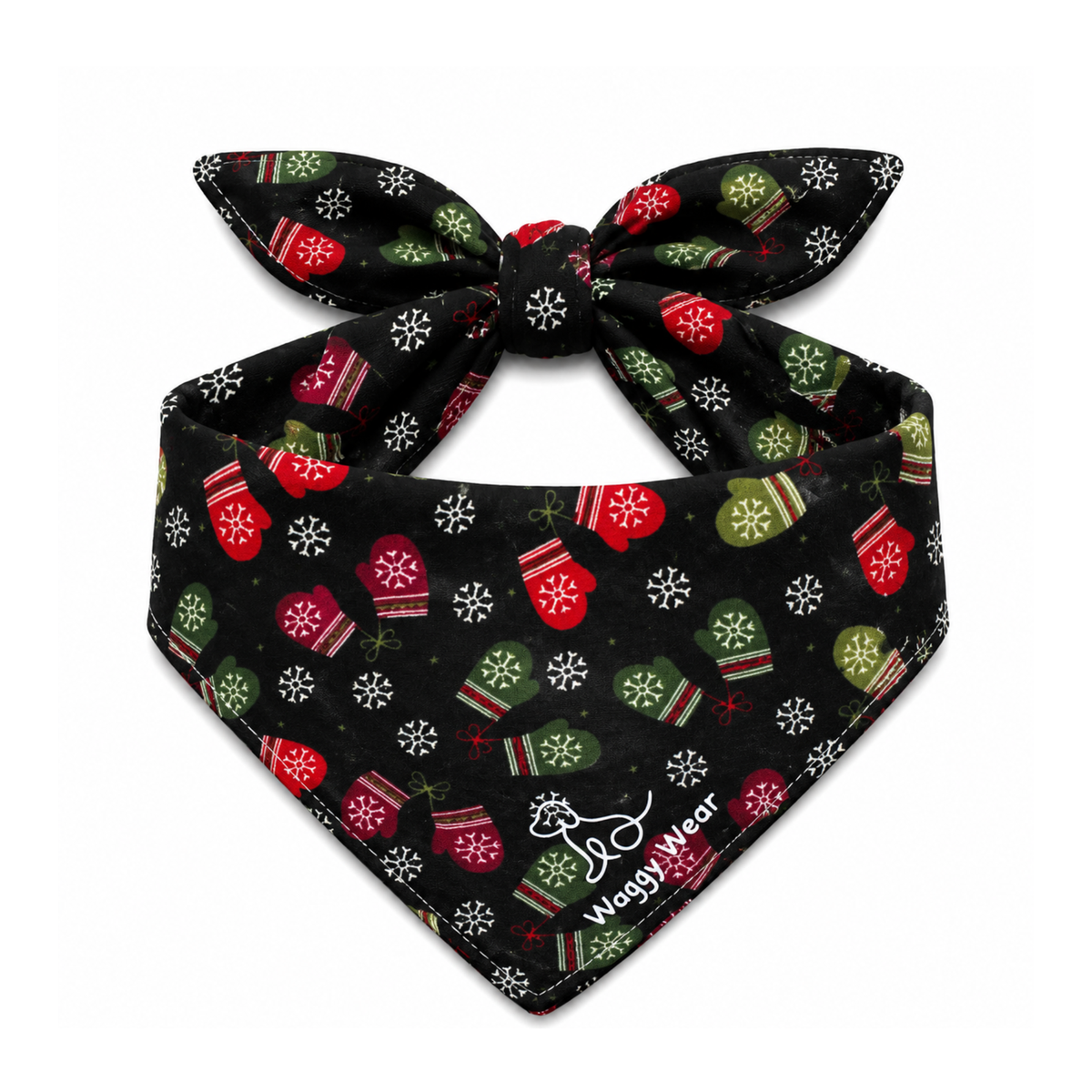 Black dog bandana with red and green Christmas mittens and snowflakes, tied in a bow by Waggy Wear