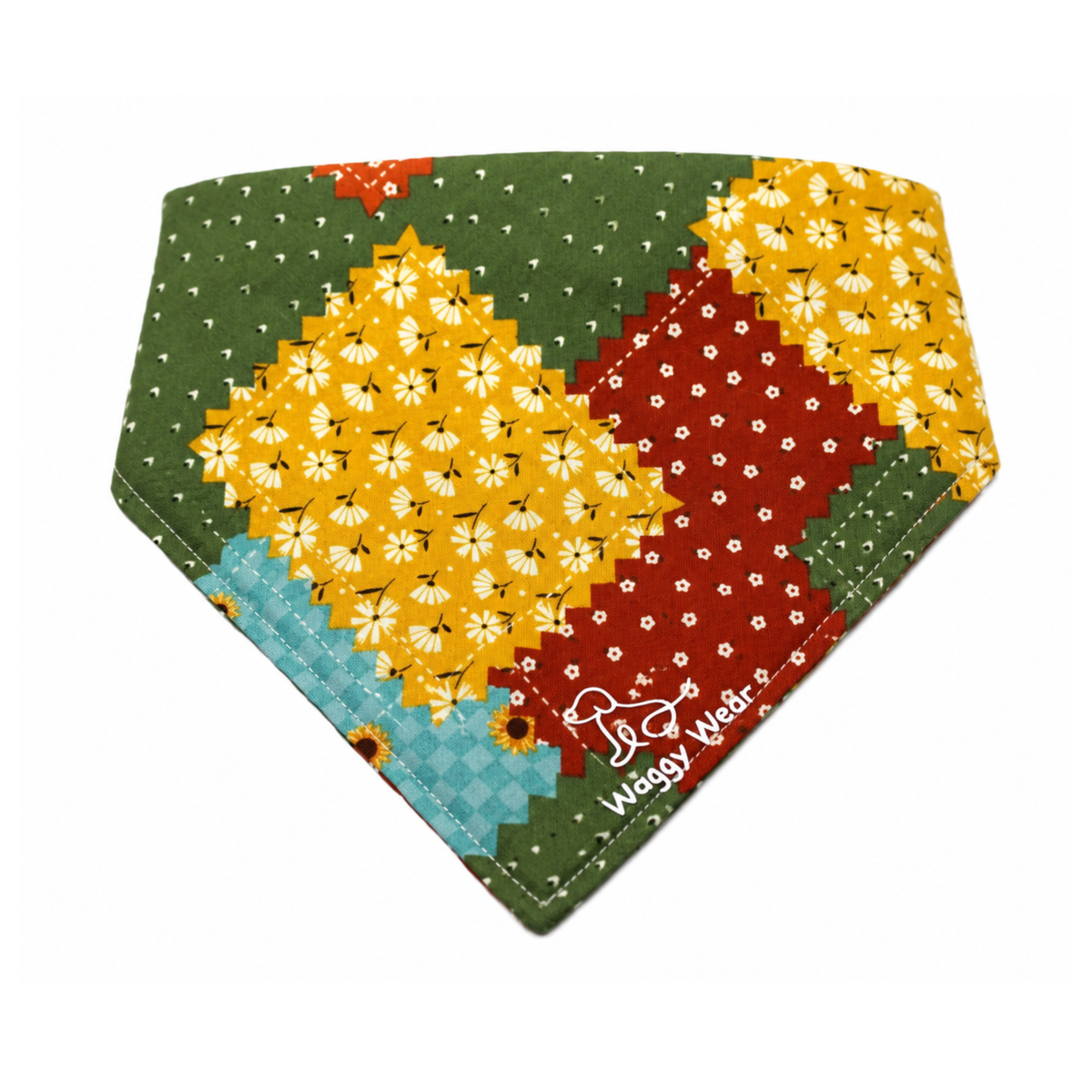 Multicolored patchwork dog bandana with floral patterns and a Waggy Wear logo on a white background.