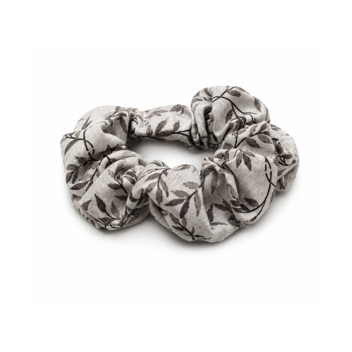 Spooky Vines hair scrunchie in cream with dark leafy vine pattern